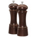 A close-up of a wooden Chef Specialties salt and pepper mill set.