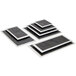 A stack of rectangular black and white Tuxton Kona Lava and Bright White square plates.