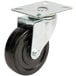 A black plate caster with a metal wheel and plate.