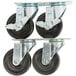 A set of four Avantco swivel plate casters with black rubber wheels and metal mounts.