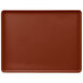 A red rectangular Cambro dietary tray with a dark brown color.