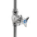 A chrome plated T&S wall mounted hose reel valve with blue 4-arm handles.