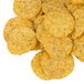 A pile of Martin's yellow round corn tortilla chips on a white background.
