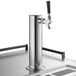 A stainless steel Beverage-Air beer tap with a black handle on a counter.