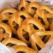 A plastic bag filled with Dutch Country Foods soft pretzels.