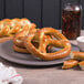 A plate of Dutch Country Foods soft pretzels on a table.