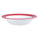An Arcoroc white opal glass bowl with a red rim.