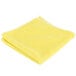 A yellow Unger SmartColor microfiber cleaning cloth.