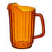 A brown SAN plastic beverage pitcher with a handle.