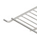 An Avantco stainless steel shelf for a merchandiser refrigerator or freezer.