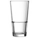 An Arcoroc highball glass filled halfway with a clear liquid.