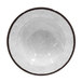 A close-up of a white Elite Global Solutions melamine bowl with a brown rim.