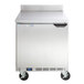 A silver Beverage-Air compact worktop freezer with wheels.