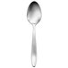 A Oneida Sestina stainless steel serving spoon with a white handle.