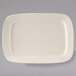 A white rectangular Tuxton china platter with a small white border.