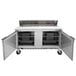A Beverage-Air stainless steel 2 door refrigerated sandwich prep table.