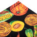 A white chef neckerchief with a colorful vegetable pattern.
