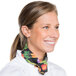 A woman wearing an Intedge vegetable patterned chef neckerchief around her neck.