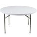 A Lancaster Table & Seating white round folding table with metal legs.