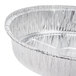 A close-up of a Durable Packaging round aluminum foil pan with a white background.