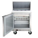 A Beverage-Air stainless steel refrigerated sandwich prep table with a left-hinged door open.