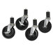 A set of four black rubber stem casters with wheels.