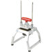 A metal and red Vollrath InstaCut 3.5 wedger on a table.
