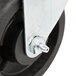 A close-up of a 4" black swivel plate caster wheel with a metal bolt.