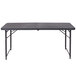 A Flash Furniture rectangular dark gray plastic folding table with metal legs.