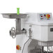 A Doyon commercial floor mixer with a metal bowl and attachment hub on a white background.