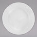 A white Arcoroc brunch plate with a swirl design.