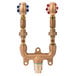 A T&S Brass wall mounted mixing valve assembly with blue and red handles.