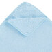 A light blue microfiber cloth with a white edge.