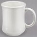 An Acopa ivory stoneware coffee mug with a white handle.