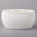 A white bone china sugar pot with three compartments.