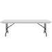 A white rectangular Correll folding table with a gray top and black legs.