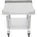 An APW Wyott stainless steel equipment stand with wheels and a galvanized undershelf.