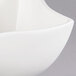 An American Metalcraft Prestige wave porcelain bowl with a curved edge.