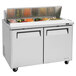 A Turbo Air refrigerated sandwich prep table with two doors and two drawers.
