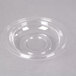 A clear plastic dome lid on a Fineline 32 oz. bowl.