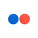 A red and blue circle with white background.