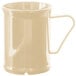 A beige mug with a handle.