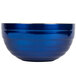A cobalt blue Vollrath metal serving bowl with a silver rim.