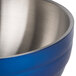 A cobalt blue Vollrath metal serving bowl with a stainless steel handle.