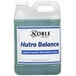 A white jug of Noble Chemical Nutra Balance liquid laundry neutralizer with blue liquid inside.