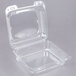 A Durable Packaging clear plastic hinged take-out container with an open lid.