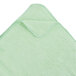 A green Rubbermaid microfiber cloth with a white folded edge.