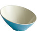 A white melamine bowl with a blue and white rim.
