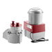 A Robot Coupe R2N food processor with a white and red cover.