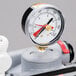 3M Water Filtration Products ICE260S water filtration system with a pressure gauge.